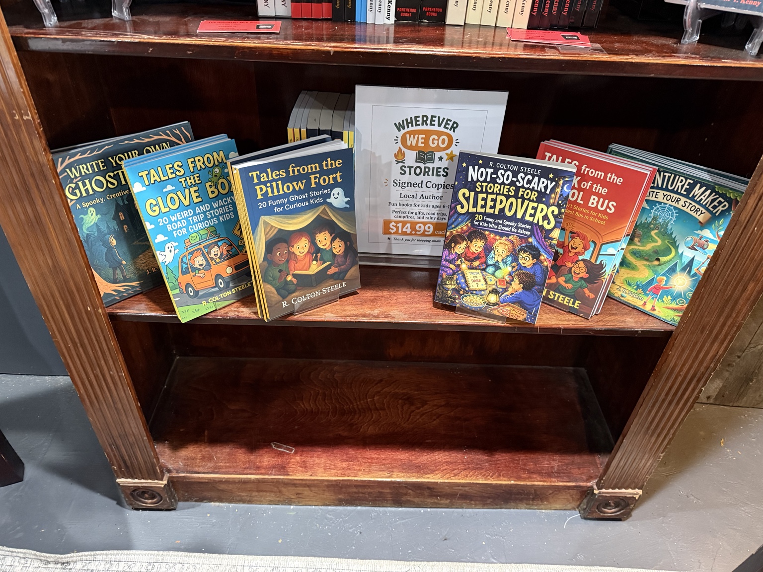 Wherever We Go books displayed on a wooden shelf at a local retail partner